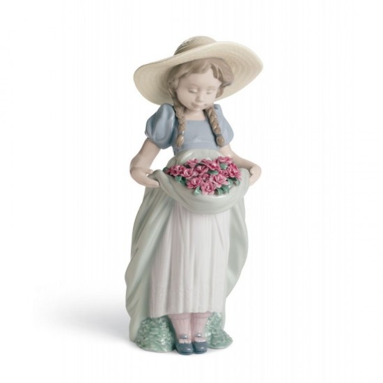 Figura de porcelana de Lladró La niña del prado (claveles)