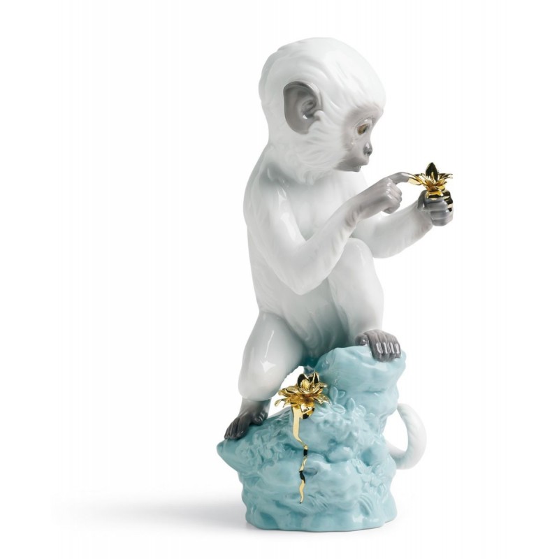 Figura de porcelana de Lladró Curiosidad - Mono en roca turquesa