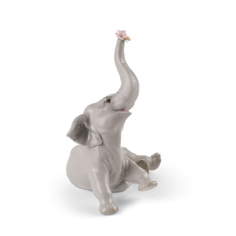 Figura de porcelana de Lladró Elefante bebé con flor rosa