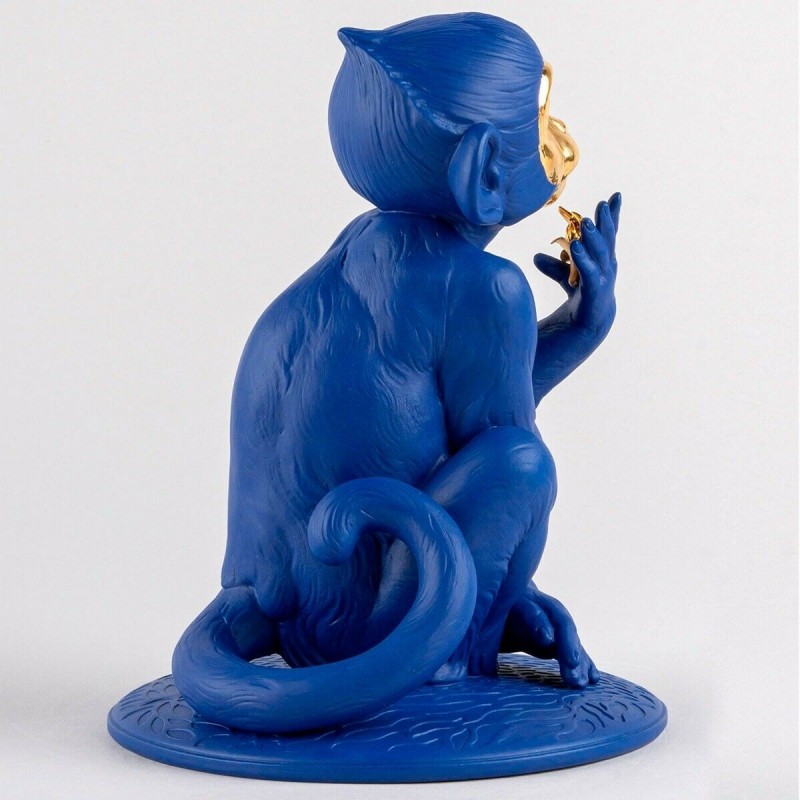 Lladró porcelain figurine of a blue-gold monkey_back view