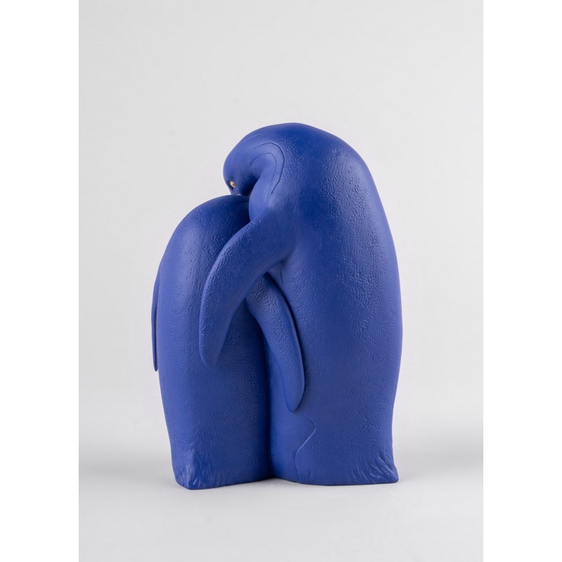 Figurine en porcelaine de Lladró Famille de pingouins (bleu-or) _behind