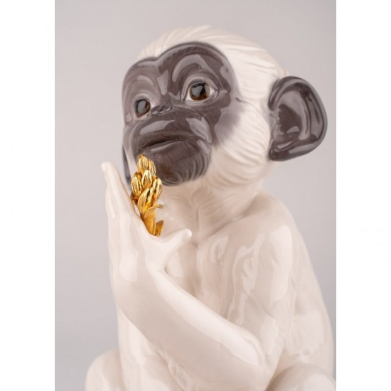 Figura de porcelana Lladró de un mono blanco_detalle cara