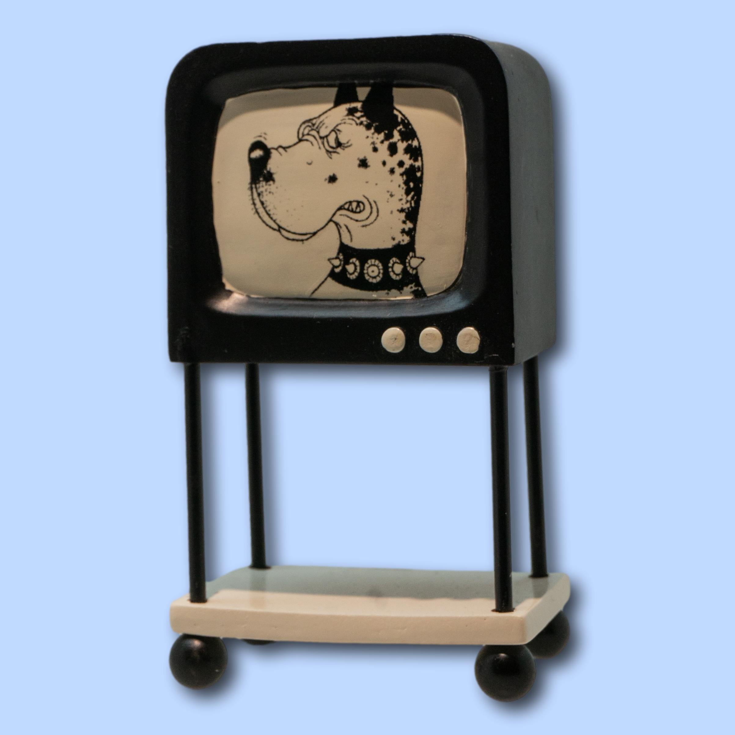 Gatos sillon y tele