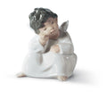 �ngel pensando